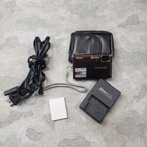 Nikon Coolpix S51 8.1MP Digital Camara Charger Battery W/case
